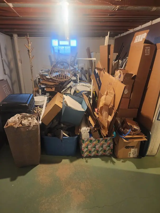 Roll-off dumpster container at job site for 2 Yard Dumpster Rental in Newport